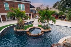Signature Series Insane Pool with spa island