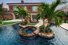 Signature Series Insane Pool with spa island